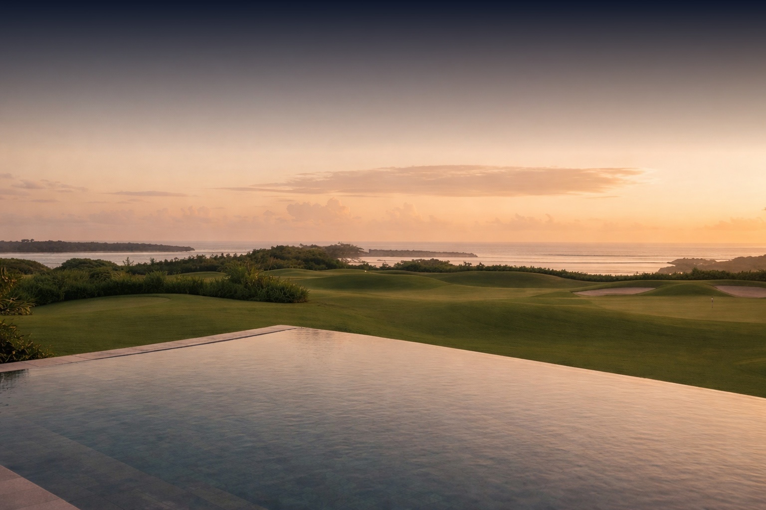 Luxury villa overlooking New Kuta Golf course and the Indian Ocean at sunset in Balangan, Bali